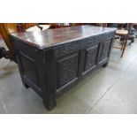 A Charles II carved oak coffer