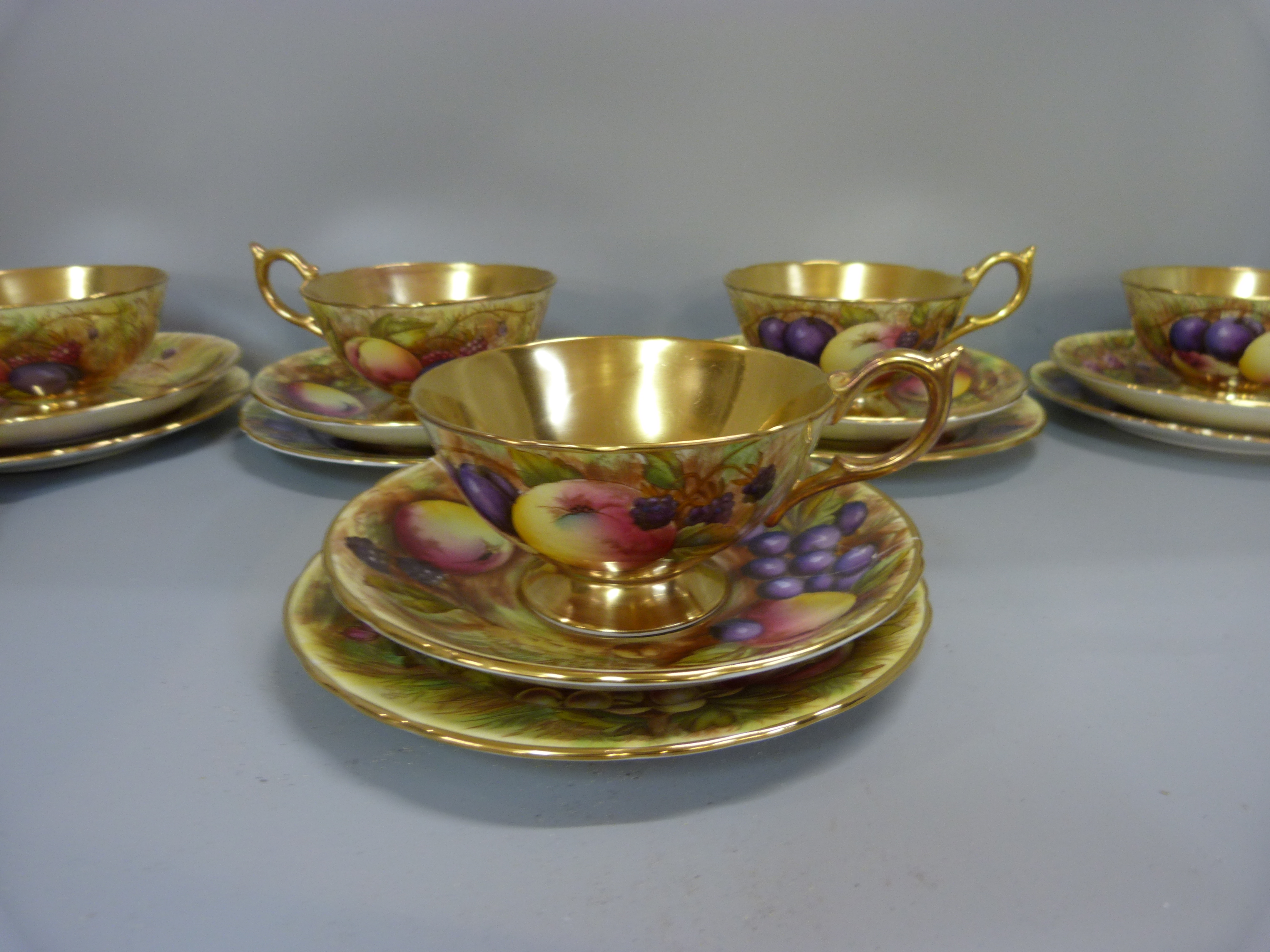 A set of six Aynsley cups, saucers and tea plates, decorated with fruit and berries in gold rim - Image 6 of 13