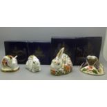 Four Royal Crown Derby paperweights, Meadow Rabbit, Baby Rabbit, Piglet and Mole, all boxed, two