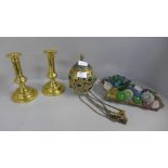 A pair of brass candlesticks, Persian glass set and brass hanging light shade and a brass and
