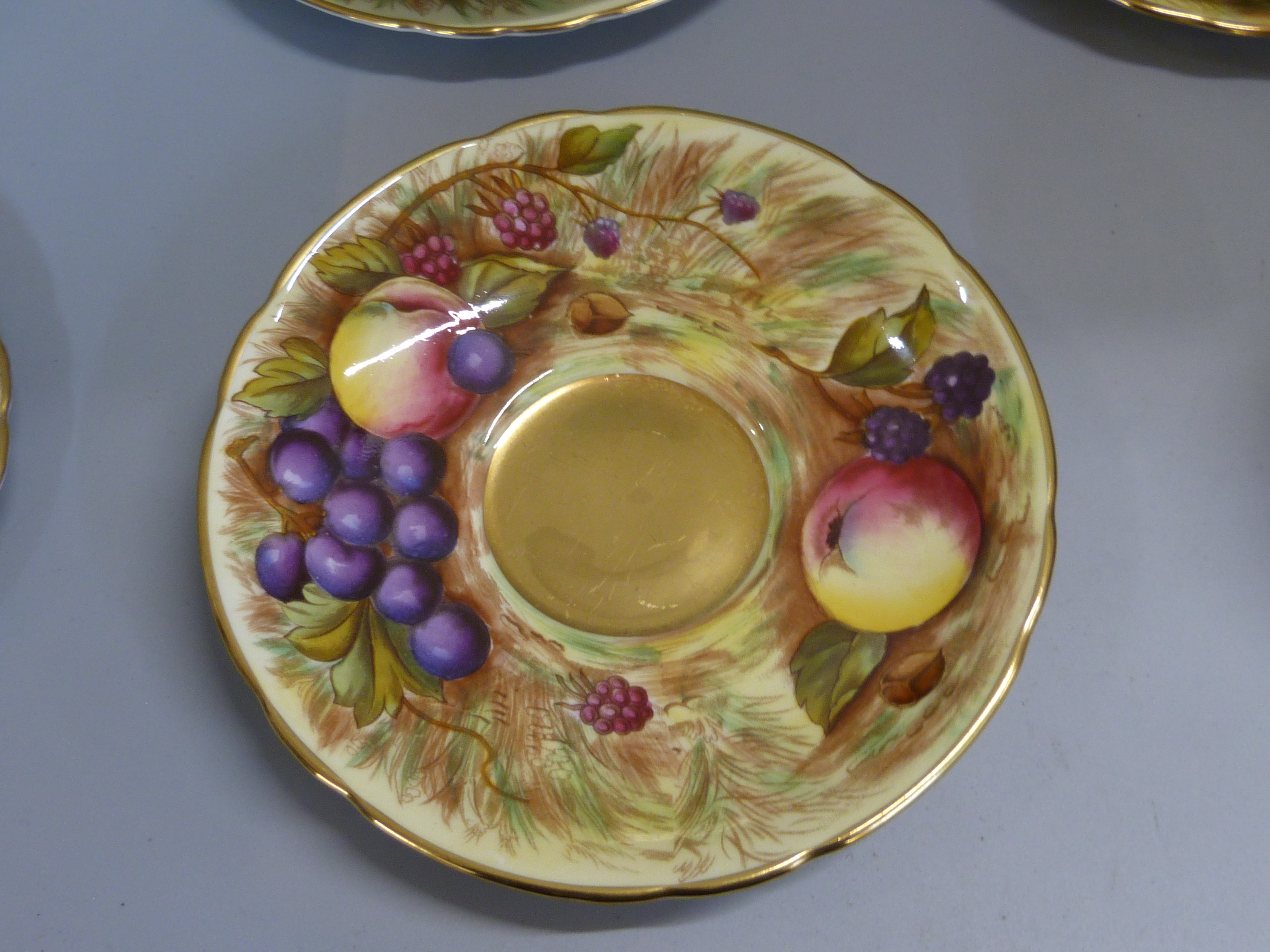 A set of six Aynsley cups, saucers and tea plates, decorated with fruit and berries in gold rim - Image 11 of 13