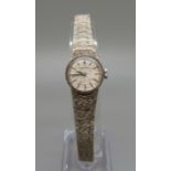 A lady's silver Longines wristwatch, with box