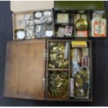 A collection of pocket watch parts, fusee barrels and dial false plates