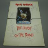 Iron Maiden autographed programme comprising of Bruce Dickinson, Clive Burr, Adrian Smith, Steve