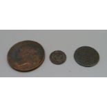 A Victorian 1841 penny and two other coins