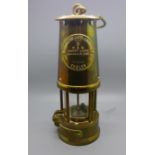 An Eccles Type 6 miner's safety lamp, with personalised name plate