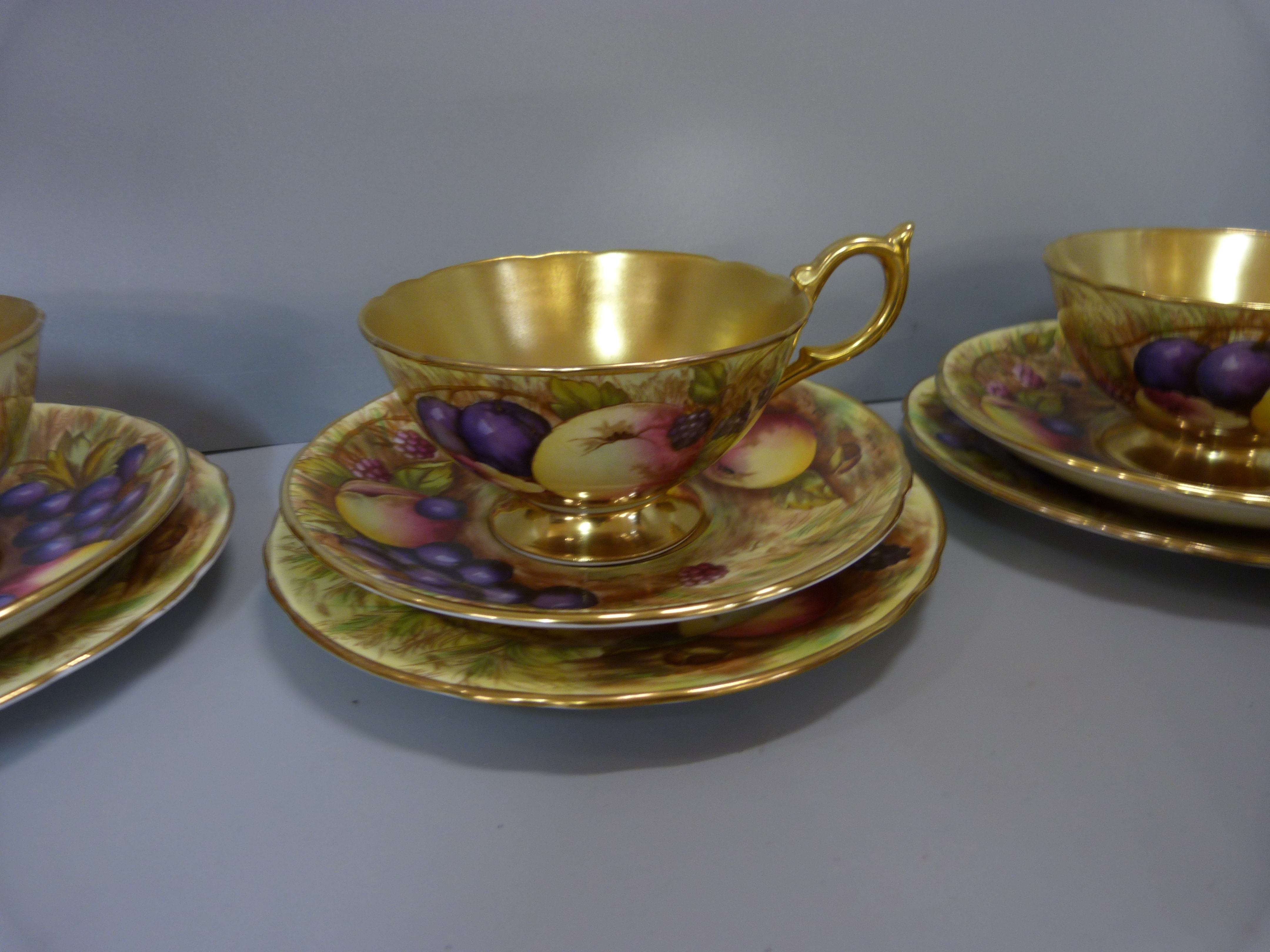 A set of six Aynsley cups, saucers and tea plates, decorated with fruit and berries in gold rim - Image 5 of 13