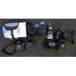 A collection of cameras including Nikon D80, D300S with accessories, a Nikon flash and Nikon lens