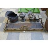 A brass fender, coal bucket, a samovar and a set of kitchen scales and weights