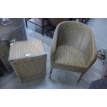 A Sirrom gold wicker chair and and linen basket