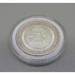 A 1oz. fine silver Max Keiser Ethical Silver Round