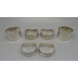 Three pairs of George V hallmarked silver napkin rings, engraved 1 to 6, makers Henry Griffith &