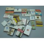 A selection of cigarette boxes and match boxes