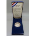 An Official Pearl Harbour Dala silver commemorative medal, .999 fine silver proof, Royal Hawaiian