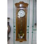 An oak Vienna wall clock