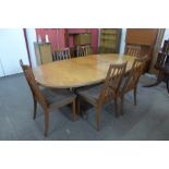 A G-Plan Fresco teak extending dining table and chairs