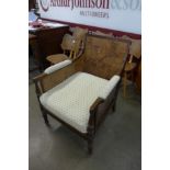 A Regency mahogany bergere library chair