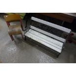 A child's cast iron ended garden bench and a set of five stacking chairs