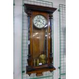 A 19th Century walnut Vienna wall clock