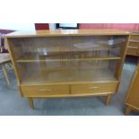 A Jentique teak bookcase