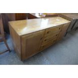 An Ercol Blonde elm Windsor sideboard