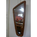 A teak framed mirror