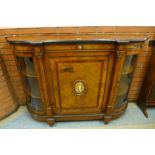 A Victorian inlaid walnut and burr yew credenza with gilt metal mounts and Sevres style porcelain