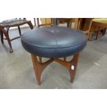 A G-Plan Fresco teak and black vinyl stool