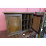 A Victorian mahogany fitted two door pigeon hole cabinet, 47cms h, 68cms w, 28cms d