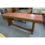 A Waring & Gillow oak and red leather topped library or console table, 81cms h, 214cms w, 53cms d