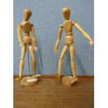 Two wooden articulated artists lay figures