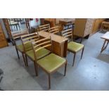 A G-Plan Fresco teak drop-leaf table and six chairs