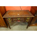 A George III carved oak lowboy