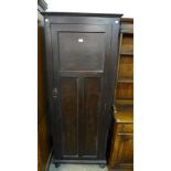 An early 20th Century pine and plywood gun cupboard