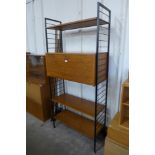 A Staples teak Ladderax room divider