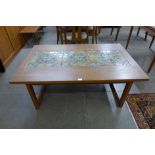 A large Danish Dyrlund teak and tiled topped coffee table