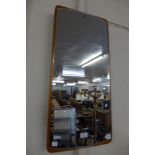 A teak framed mirror