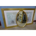 A gilt oval framed mirror and a pair of still life prints