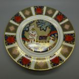 A Royal Crown Derby plate, 2001, Thistle Donkey, with certificate, limited edition