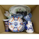 A collection of flow blue china, a vegetable dish and cover, oval serving plate, Willow pattern