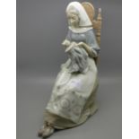 A large Lladro figure, Embroiderer