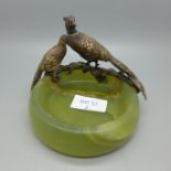 A cold painted bronze model of Pheasants on an onyx ashtray