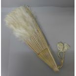 A lady's late Victorian fan in silk and ostrich feather