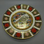 A Royal Crown Derby Christmas plate, Millennium Dove, with certificate, boxed