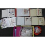 A collection of stamps, five albums a tub of loose stamps and stock sheets