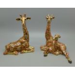 Two metal Giraffe Hidden Treasures figures
