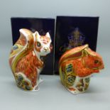 Two Royal Crown Derby Squirrel paperweights, Woodland Squirrel with gold stopper, 11cm and Red