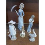 A collection of Lladro and Nao figures, large one a/f and a Goebel figure