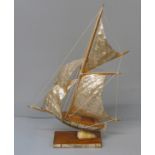 A model sailing boat made from abalone, 31cm