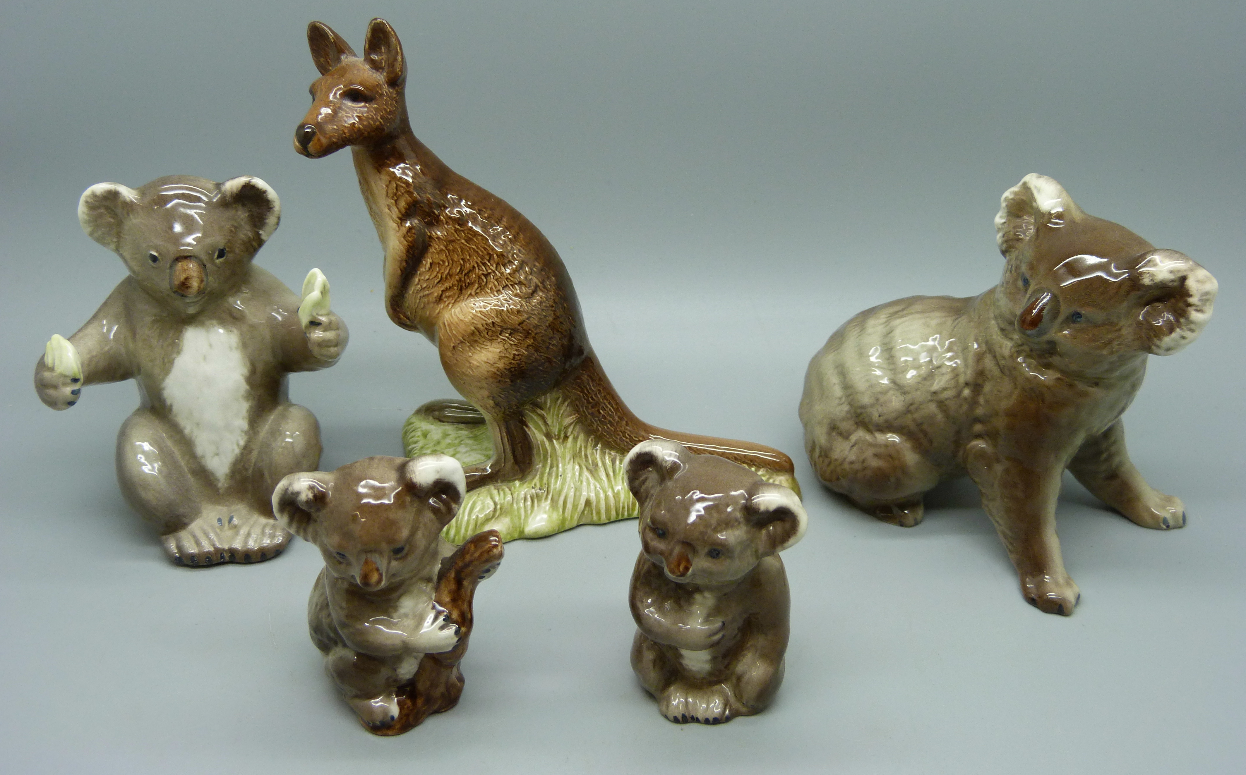 Four Beswick koalas and a Beswick kangaroo